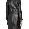 Kate Moss in black leather and shearling trench coat in London on December 16