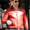 London Visit Nick Jonas Red jacket