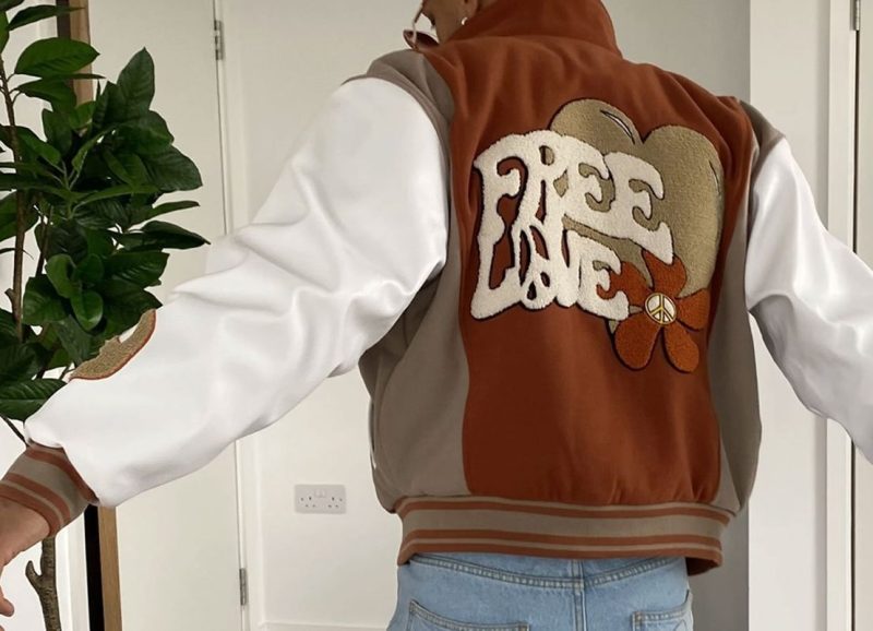 The Free Love Curly Varsity Jacket back view