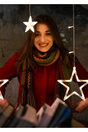 I Hate Christmas 2022 Pilar Fogliati Red Jacket