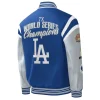Product Specification: Material: Satin Internal: Viscose Lining Color: Royal Blue and Gray Front: Snap-tab Buttoned Closure Collar: Rib-knitted collar Sleeves: Long Sleeves Hemline: Rib-knitted Cuffs: Rib-knitted Cuffs Pockets: Two waist pockets outside and inside pockets Stitching: Fine Logo: Los Angeles Dodgers graphics on the front, sleeves and back